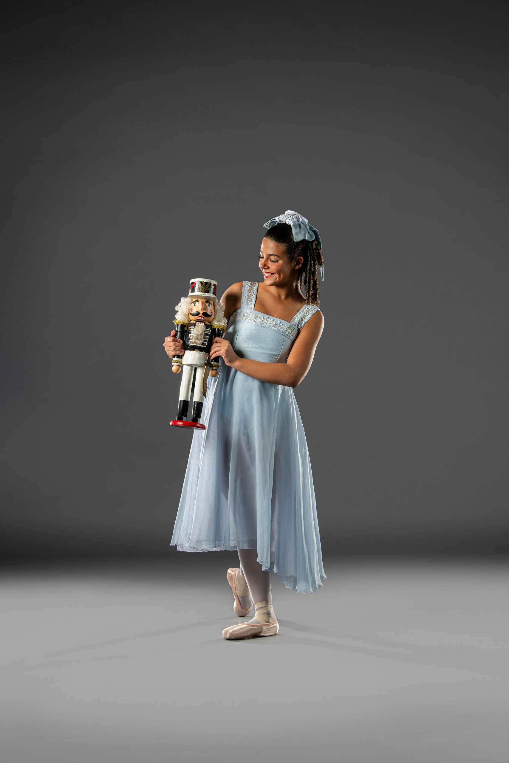 Group of dancers on stage performing Act 1 from The Nutcracker Ballet